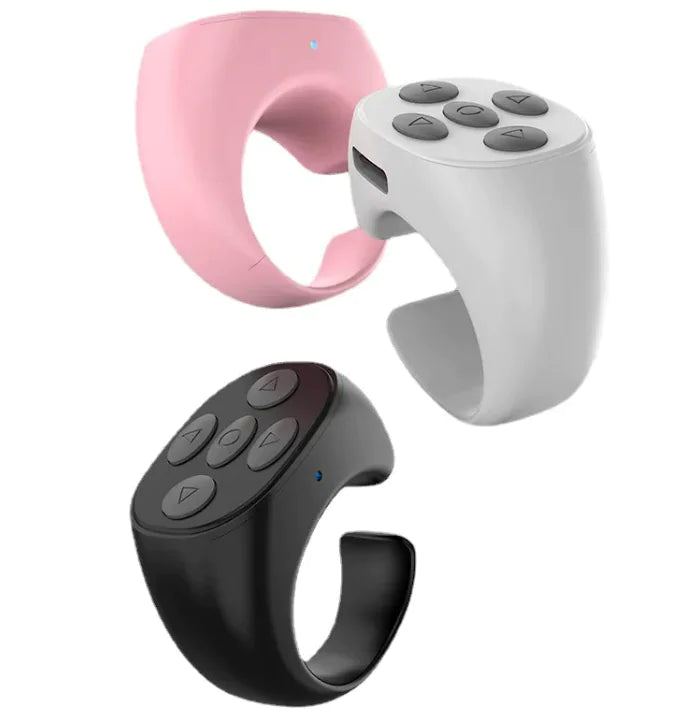 The Jstoremart black silicone ring features a remote control surface with five buttons in a circular pattern. With universal compatibility, it serves as an ideal Bluetooth remote for various devices.