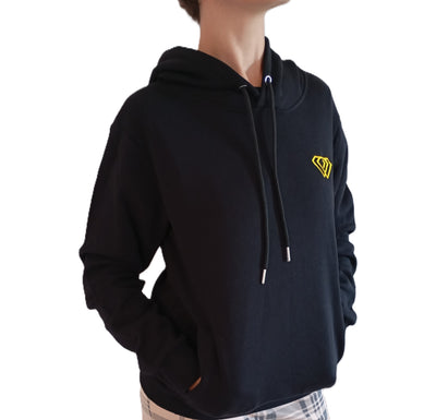 Unisex balck hoodie from J-Clothing, featuring a minimalist design with a relaxed fit and soft cotton fabric — styled for everyday comfort and confidence